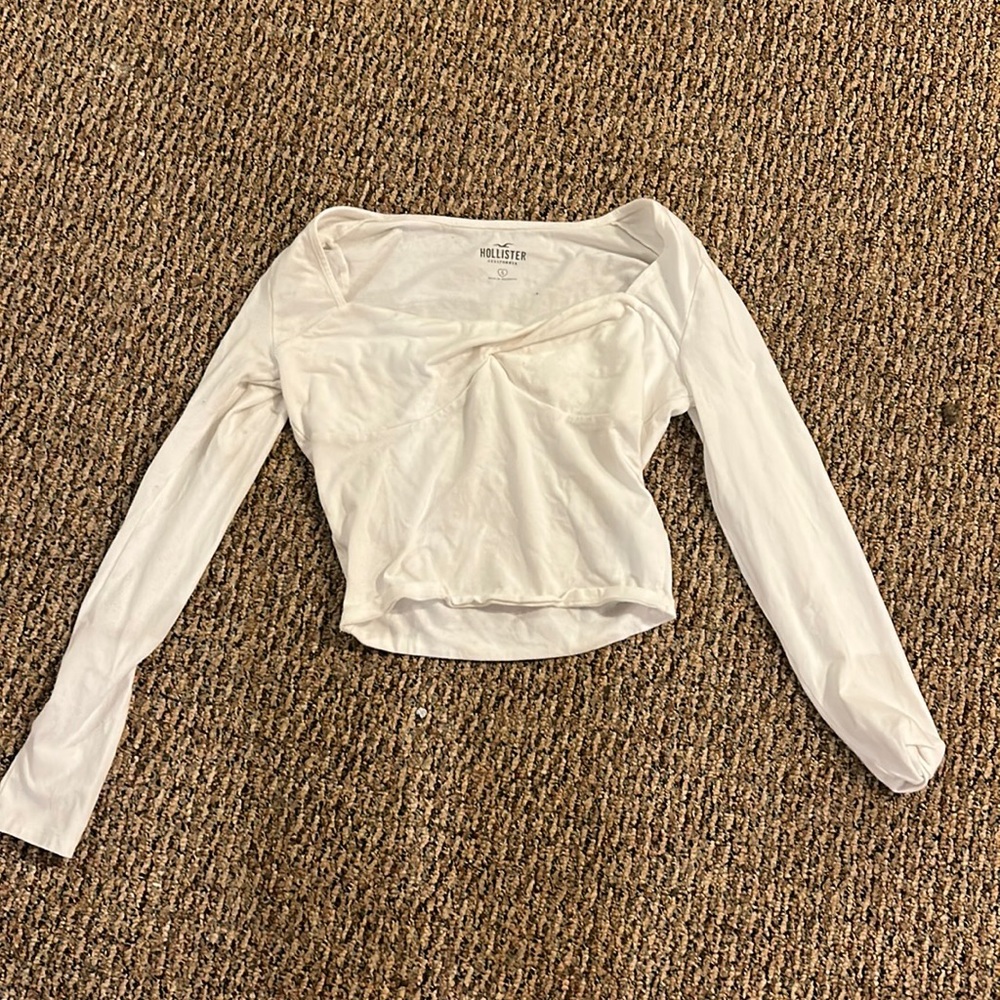 White hollister tight long sleeve with cross in front